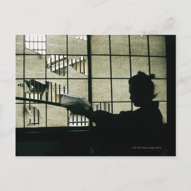 Samurai warrior cleaning a sword postcard (Front)