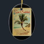 San Cristobal Palm Tree Vintage Travel Ceramic Tree Decoration<br><div class="desc">A uniquely retro mid-century modern San Cristobal Dominican Republic art print in vintage travel poster style. It features a curved palm tree on sandy beach with ocean under a blue cloudy sky.</div>