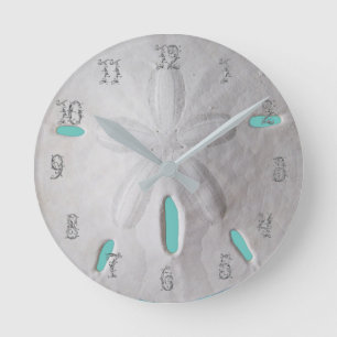 Sand dollar ocean beach white turquoise round clock