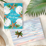 Sand Dollars Starfish Beach Christmas Folded Cards<br><div class="desc">Folded beach themed Christmas cards. Starfish and sand dollars make a pretty wreath on the front over blue water. Customise with your choice of greeting. Sample is "Merry Christmas" with more wording inside for your personal greeting and signature. A light water background covers the front and inside and text is...</div>