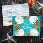 Sand Dollars Starfish Christmas Message Postcards<br><div class="desc">Beach themed Christmas postcard with starfish and sand dollars design. Add your choice of greeting to the front. "Merry Christmas" is the sample wording, with a place for additional message and signature on the back. A blue water background and seashell wreath is the background for white script. More water makes...</div>