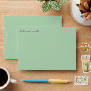 Sandbagger green small envelopes front top