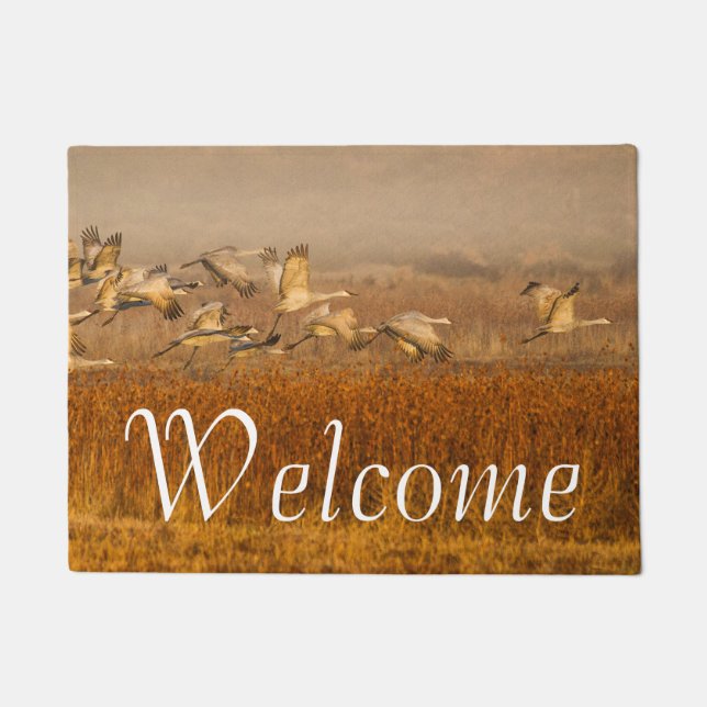 Sandhill Cranes over a golden field Doormat (Front)