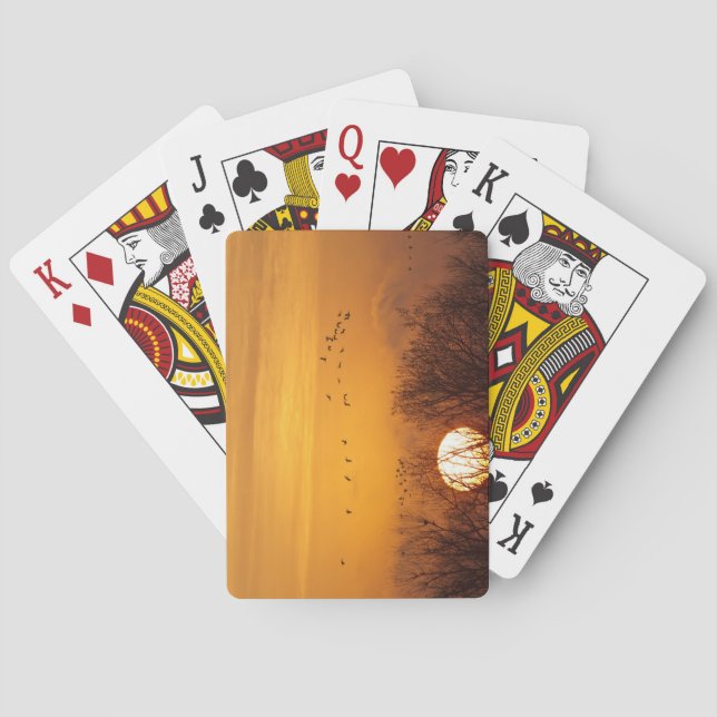 Sandhill cranes silhouetted aginst rising sun playing cards (Back)