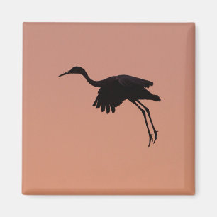 sandhill silhouette on a pink sunset sky magnet