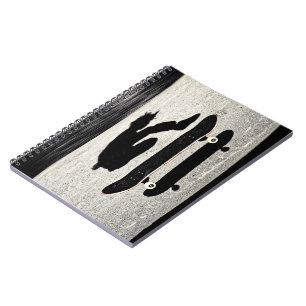 sandwiched skateboard notebook