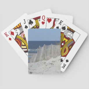 Sandy beach and weathered beach fence playing cards