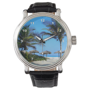 Sandy Beach With Palm Trees and An Ocean View Watch