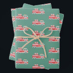 Santa and Mrs. Claus on a Christmas Firetruck  Wrapping Paper Sheet<br><div class="desc">Mrs. Claus and Santa are coming to town in this adorable firetruck illustration!</div>