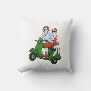 Santa and Mrs. Claus riding a scooter Cushion