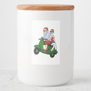 Santa and Mrs. Claus riding a scooter Food Label