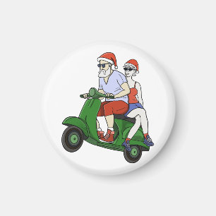 Santa and Mrs. Claus riding a scooter Magnet