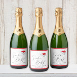 Santa Baby Christmas Baby Shower<br><div class="desc">Cute sparkling wine labels for your Christmas baby shower featuring "Santa Baby" in a chic script with a heart swash,  a watercolor of Santa's red hat,  and the name of the mummy-to-be and the shower date in simple topography.</div>