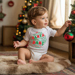 Santa Baby Personalised Retro Christmas Baby Bodysuit<br><div class="desc">Snuggle your little one in holiday style with this retro “Santa Baby” personalised body suit! Featuring festive red and green lettering, adorable snowflakes, jingle bells, and evergreen trees, this joyful design brings big Christmas cheer in a tiny package. Add your baby’s name for an extra special touch. Perfect for holiday...</div>