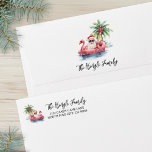 Santa Beach Christmas Return Address Card<br><div class="desc">Bring a bit of surf and sand to your holiday mail with this playful tropical Christmas envelope. On the front, the top left corner features a relaxed Santa Claus in sunglasses lounging in a pink flamingo floaty out on the ocean, with a small island and a palm tree decorated with...</div>