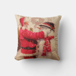 Santa claus and snowman in snowfall cushion