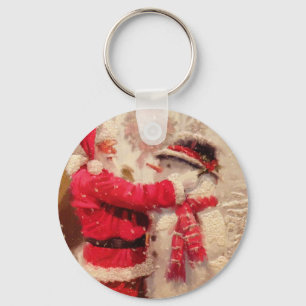 Santa claus and snowman in snowfall key ring