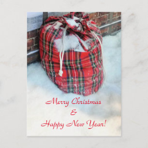 Santa Claus Bag in snow Holiday Postcard