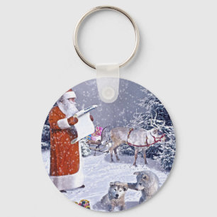 Santa Claus checking the gift list Key Ring