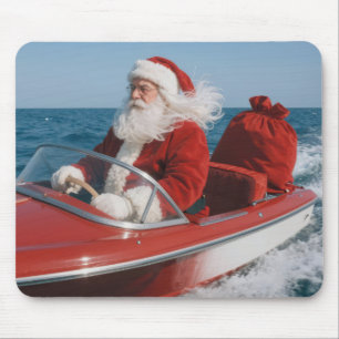 Santa Claus Delivering Gifts By Speedboat Mouse Pad