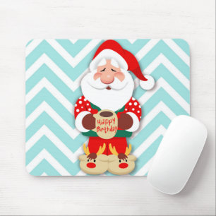 Santa claus in red pyjamas holding a mug mouse pad