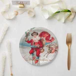 Santa Claus on a penny farthing with reindeer   Paper Plate