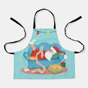 Santa Claus on the couch in pyjamas Apron