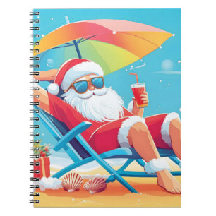 Santa Claus Relaxing on a Tropical Beach Sunbed  Notebook