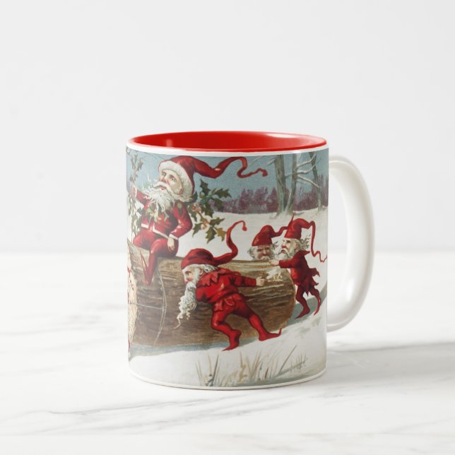 Santa Claus Riding Log as Elves Push and Pull Two-Tone Coffee Mug (Front Right)