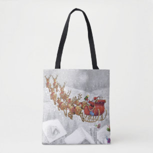 Santa Claus riding on sleigh with gift box Tote Bag