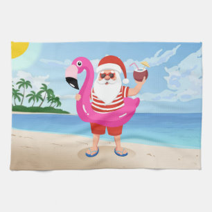 Santa Claus with flamingo inflatable ring Tea Towel