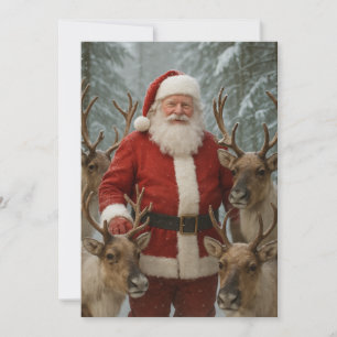 santa claus with reindeers and snowy wood holiday card