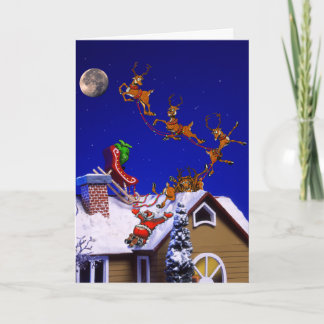 Santa crashing on a rooftop holiday card