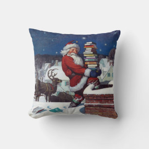 Santa delivering armload of books by Wyeth Cushion