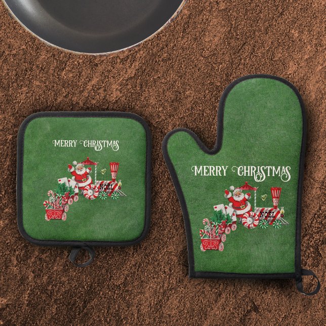 Santa Driving Festive Christmas Train Dark Green Oven Mitt & Pot Holder Set (Santa driving Merry Christmas train with candy and letters on dark green holiday potholders.)