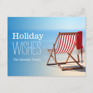 Santa hat on a deck chair. Christmas at the Holiday Postcard