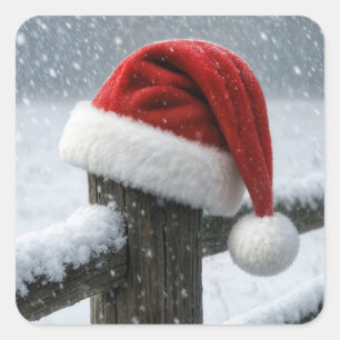Santa Hat On a Snowy Fence Post Square Sticker