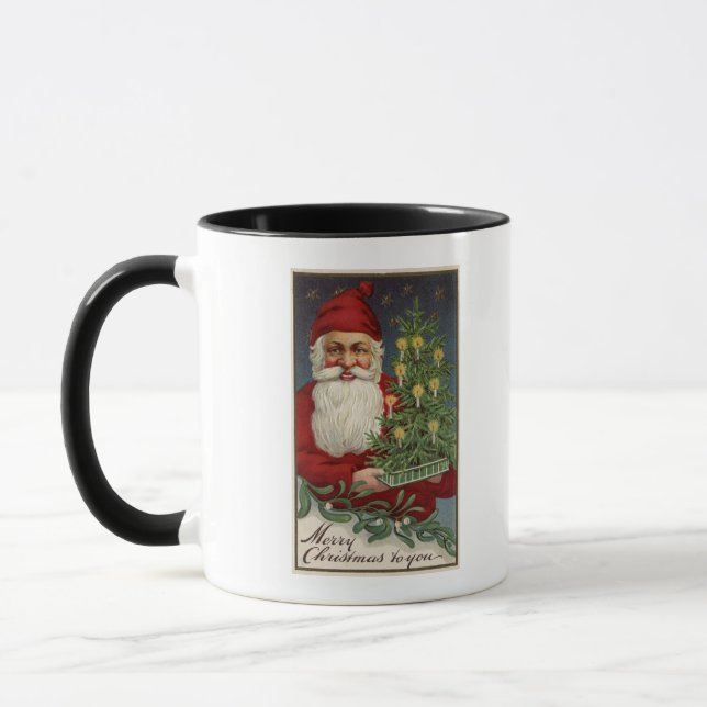 Santa Holding a Candlelit Tree Mug (Left)
