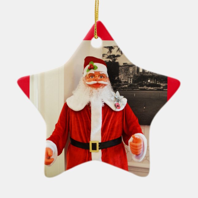 Santa in a star ceramic tree decoration (Front)