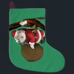 Santa Might Come A Bit Later Large Christmas Stocking<br><div class="desc">Background Colour can be changed!
Father Christmas will be delayed making his rounds this year,  girls and boys. The bald eagle was out hunting for dinner and found a fat man in a red suit! Easy pickings - great catch!</div>