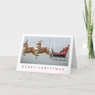 Santa reindeer and sleigh Christmas card