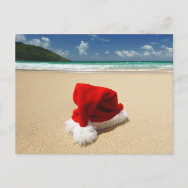 Santa's hat on a tropical beach holiday postcard (Front)