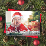 Santa's Little Helper Script Baby Christmas Photo Holiday Card<br><div class="desc">This festive holiday photo card features one horizontal full-frame (aka "full-bleed") photo and a calligraphy script greeting in white. The greeting on the front reads "Santa's Little Helper". The back has a coordinating red and white dot pattern. You can also add another photo and/or additional text to the back.</div>