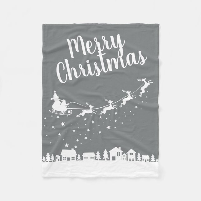 Santa's sleigh silhouette flying above the houses fleece blanket (Front)