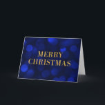 Sapphire Blue Bokeh Lights Gold Merry Christmas Holiday Card<br><div class="desc">Classy holiday greeting card featuring the words "Merry Christmas" in faux gold foil against a sapphire blue bokeh lights pattern background perfect for sending out holiday greetings to family, friends or business clients. To add text inside the the card click the "Customise" button. *Please note that the Zazzle Watermark that...</div>
