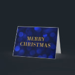 Sapphire Blue Bokeh Lights Gold Merry Christmas Holiday Card<br><div class="desc">Classy holiday greeting card featuring the words "Merry Christmas" in faux gold foil against a sapphire blue bokeh lights pattern background perfect for sending out holiday greetings to family, friends or business clients. To add text inside the the card click the "Customise" button. *Please note that the Zazzle Watermark that...</div>