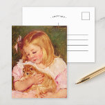 Sara Holding a Cat | Mary Cassatt Postcard<br><div class="desc">Sara Holding a Cat (1908) by American impressionist artist Mary Cassatt. Original fine art painting depicts a portrait of a little girl wearing a pink dress and holding a kitten. 

Use the design tools to add custom text or personalise the image.</div>