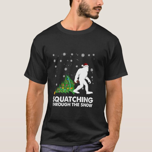 Sasquatch Bigfoo Squatching Through the Snow Chris T-Shirt (Front)