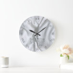 Satin Silver Elegant Wedding Anniversary Keepsake Large Clock<br><div class="desc">An elegant,  personalised wedding anniversary keepsake clock featuring a satin background and modern typography. A nice custom wedding gift for a young - and young at heart - couple celebrating their 1st,  3rd,  5th,  10,  25th or 50th anniversary.</div>