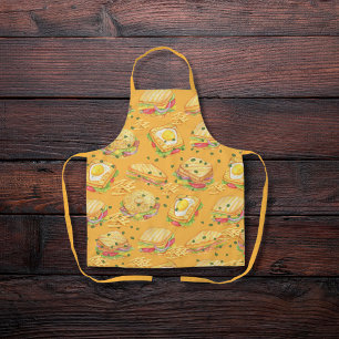 Savory gourmet sandwiches and fries orange apron
